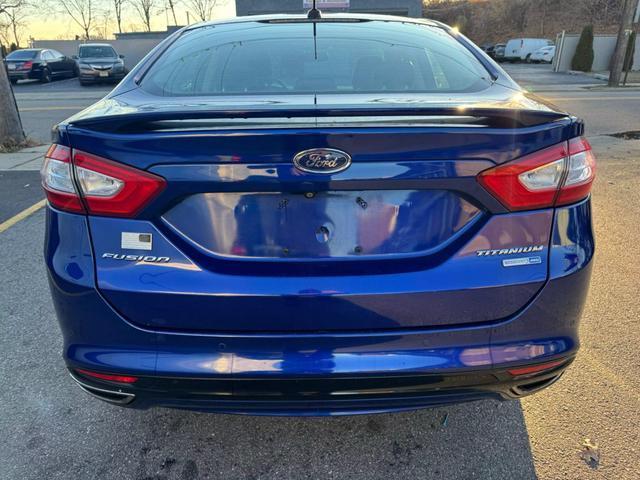 used 2014 Ford Fusion car, priced at $10,799