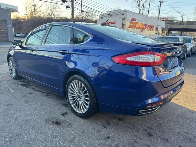 used 2014 Ford Fusion car, priced at $10,799