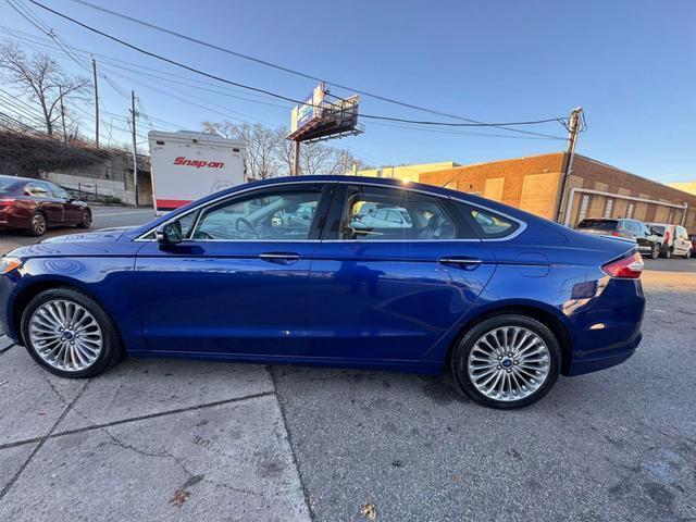 used 2014 Ford Fusion car, priced at $10,799