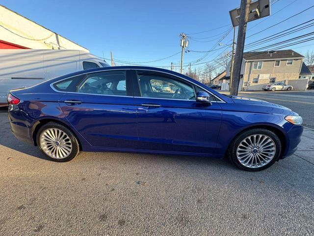 used 2014 Ford Fusion car, priced at $10,799