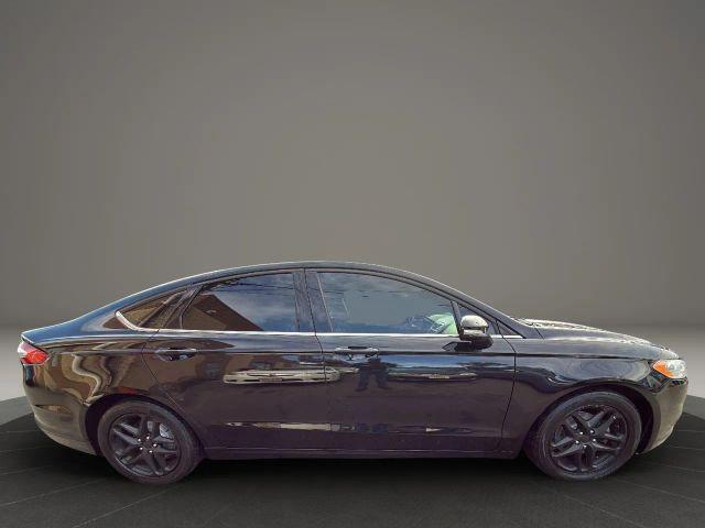 used 2016 Ford Fusion car, priced at $6,999