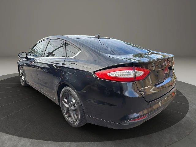 used 2016 Ford Fusion car, priced at $6,999