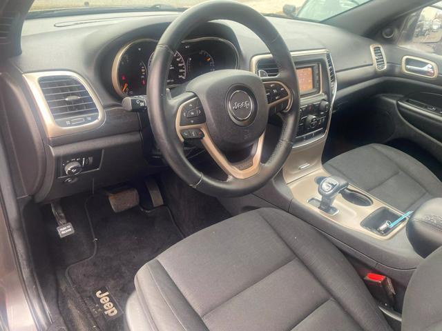 used 2014 Jeep Grand Cherokee car, priced at $9,999