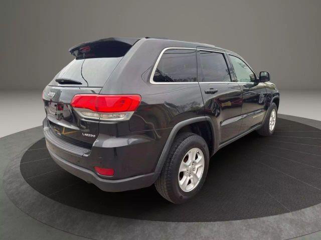 used 2014 Jeep Grand Cherokee car, priced at $9,399