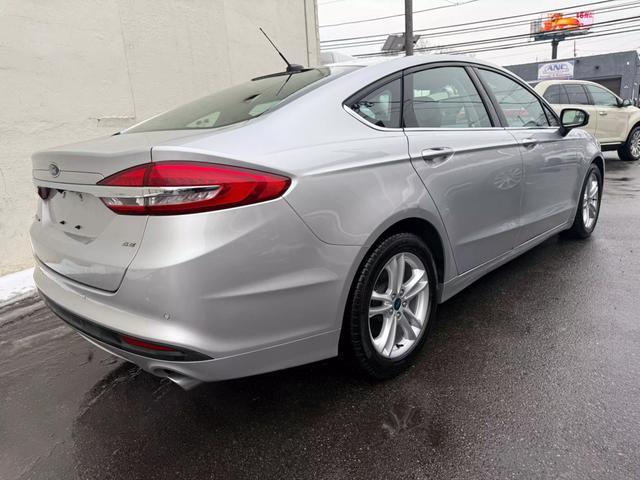 used 2018 Ford Fusion car, priced at $11,699