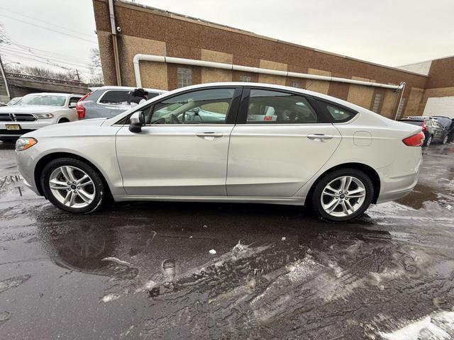 used 2018 Ford Fusion car, priced at $11,699