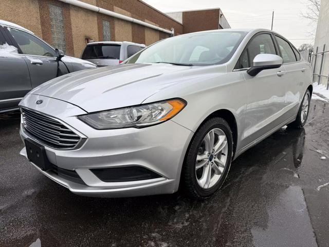 used 2018 Ford Fusion car, priced at $9,999