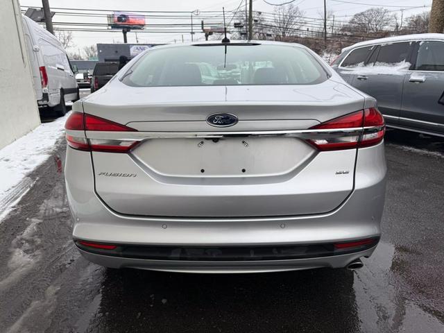 used 2018 Ford Fusion car, priced at $11,699