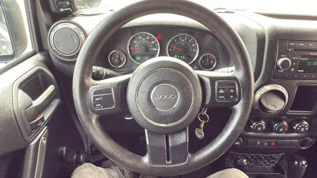 used 2015 Jeep Wrangler car, priced at $11,499