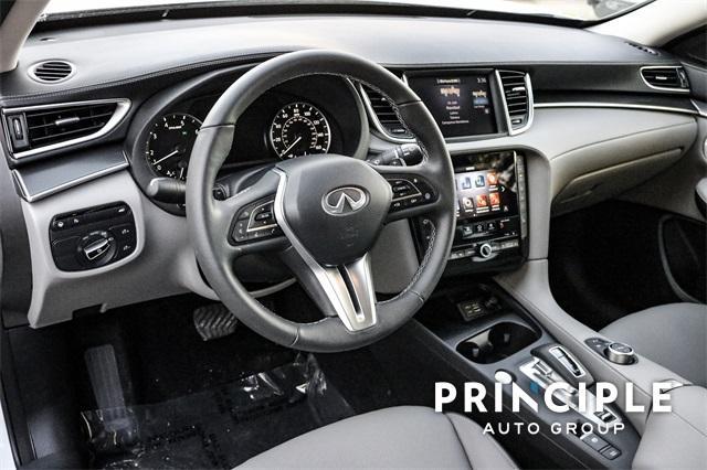 used 2025 INFINITI QX50 car, priced at $43,750