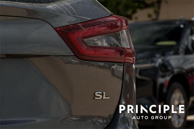 used 2022 Nissan Rogue Sport car, priced at $23,973