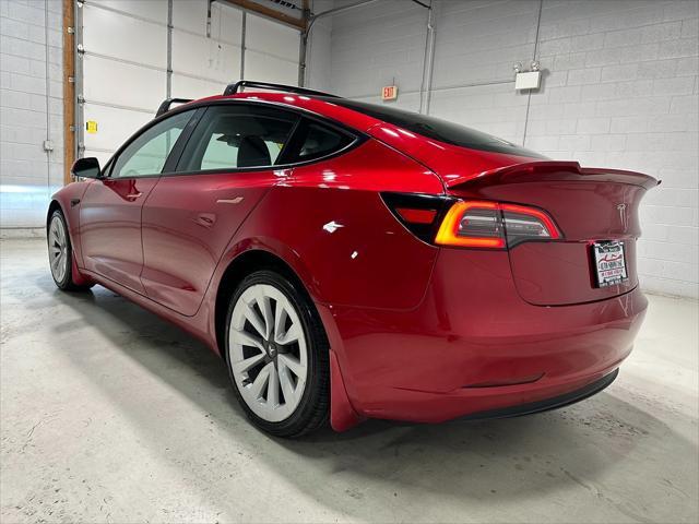 used 2023 Tesla Model 3 car, priced at $20,999