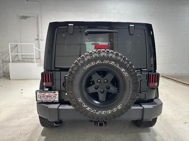 used 2012 Jeep Wrangler Unlimited car, priced at $18,995