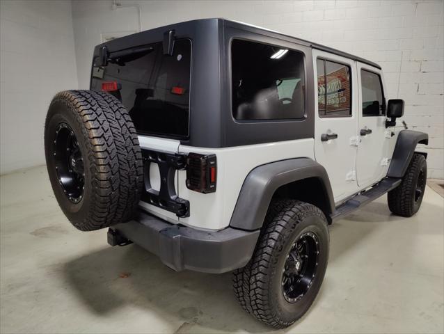 used 2014 Jeep Wrangler Unlimited car, priced at $23,995