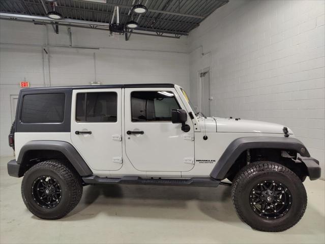 used 2014 Jeep Wrangler Unlimited car, priced at $22,995