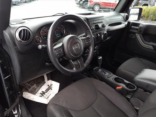 used 2015 Jeep Wrangler car, priced at $19,609