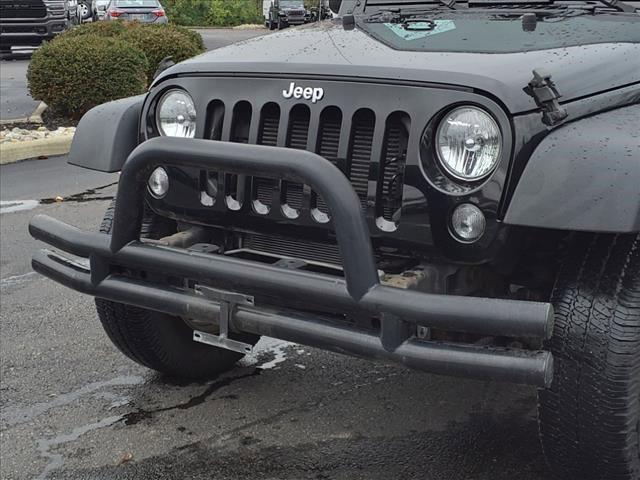 used 2015 Jeep Wrangler car, priced at $19,609