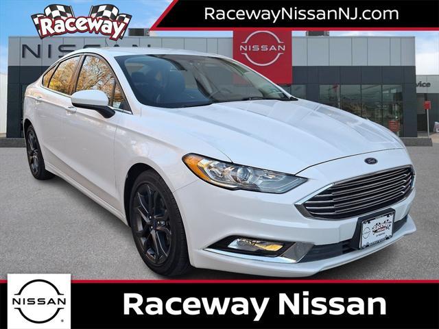 used 2018 Ford Fusion car, priced at $14,199