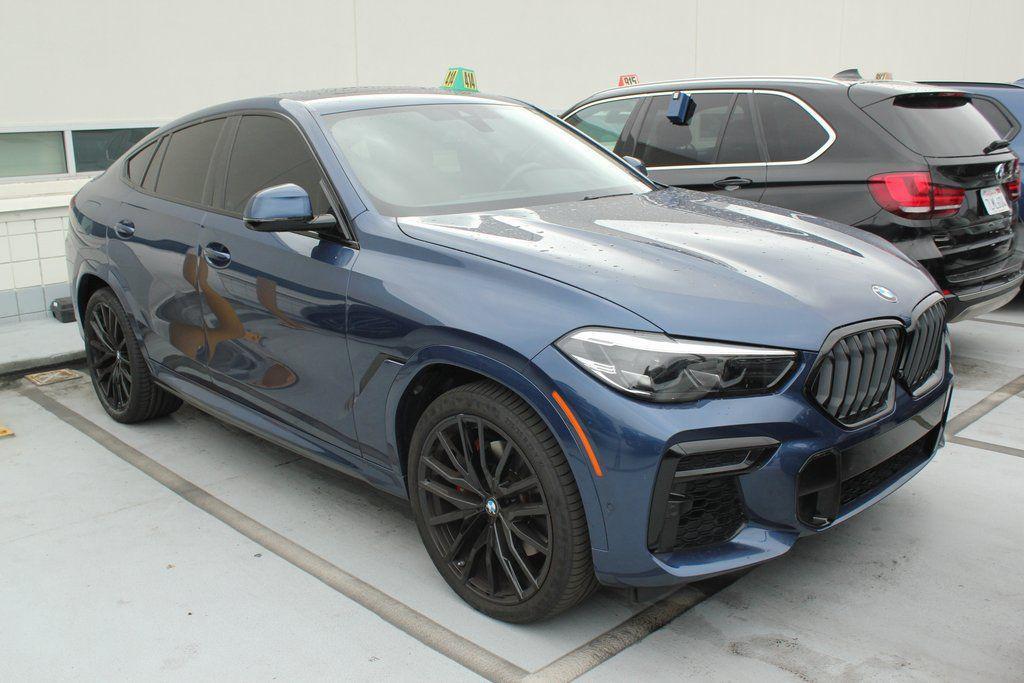 used 2023 BMW X6 car, priced at $59,422