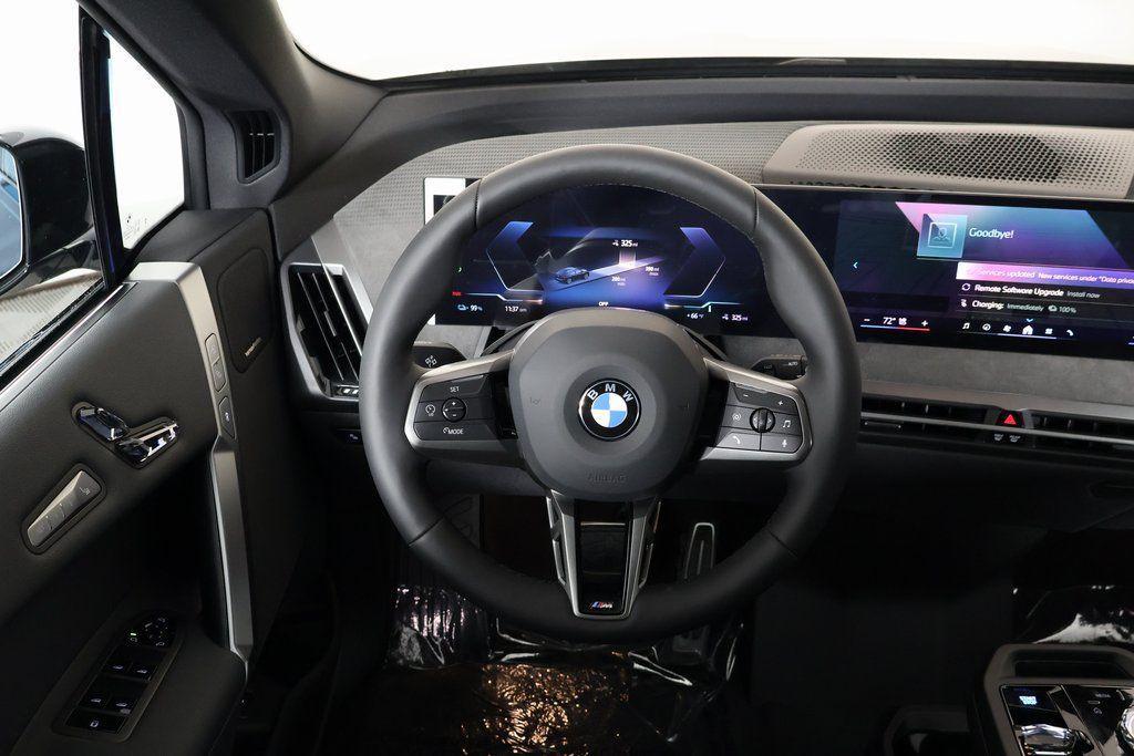 new 2026 BMW iX car, priced at $103,595