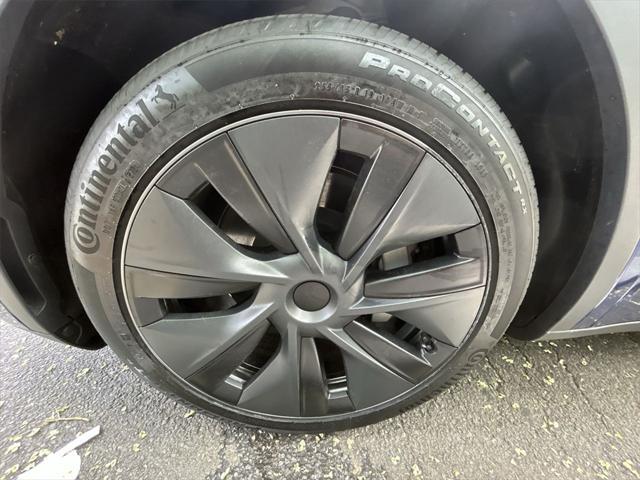 used 2024 Tesla Model Y car, priced at $35,995