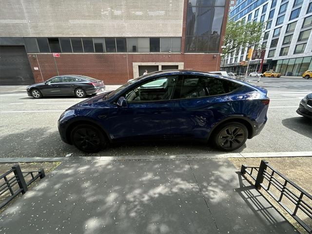 used 2024 Tesla Model Y car, priced at $35,995