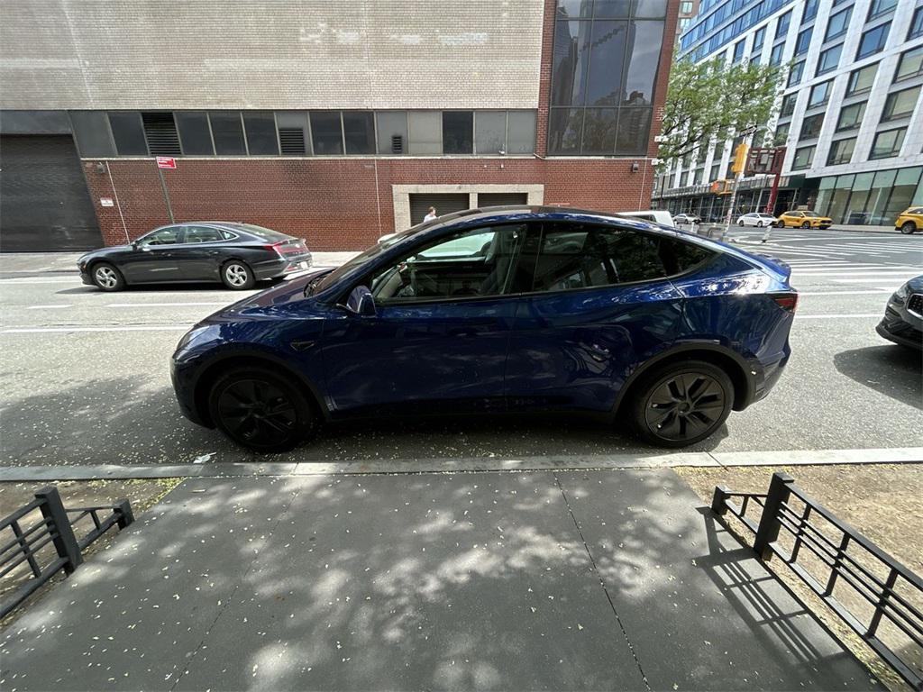 used 2024 Tesla Model Y car, priced at $33,000
