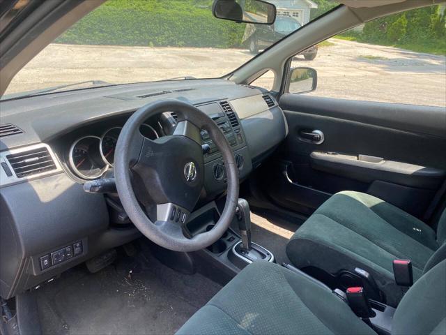 used 2012 Nissan Versa car, priced at $3,900