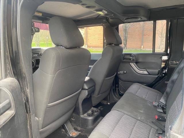 used 2011 Jeep Wrangler Unlimited car, priced at $8,900
