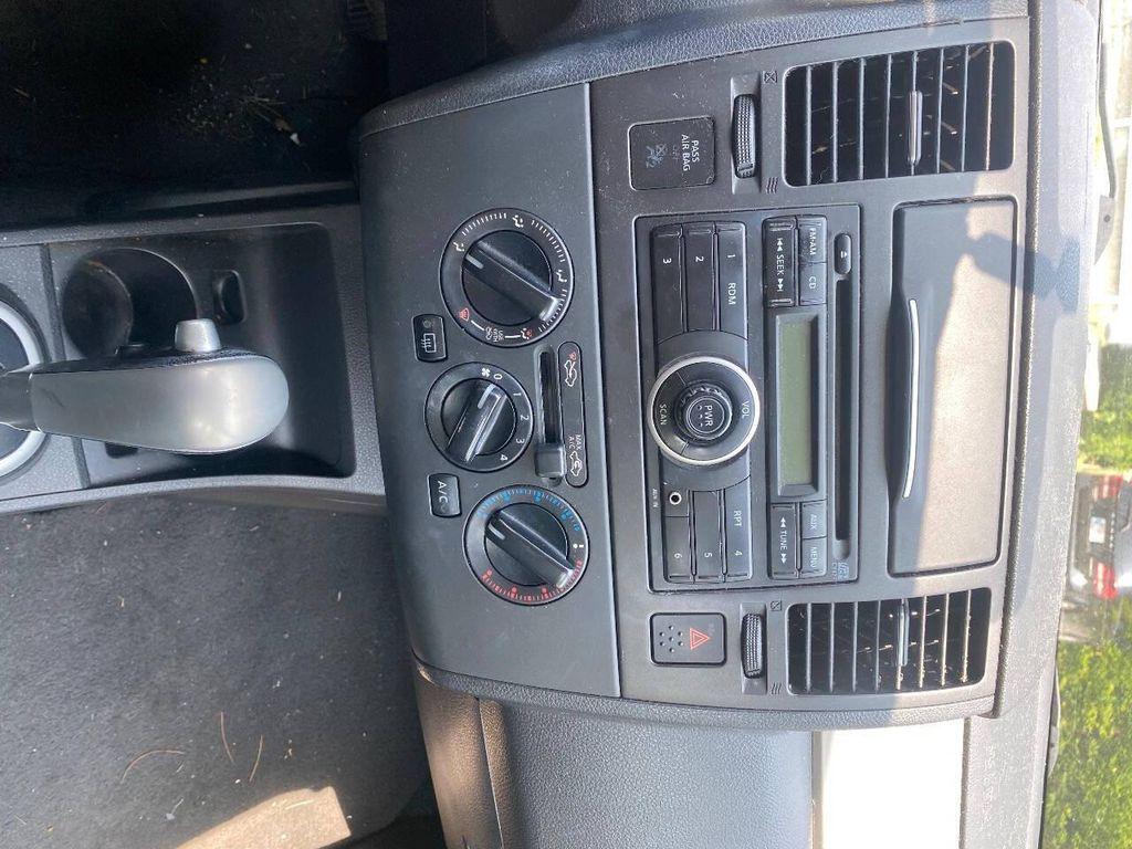 used 2012 Nissan Versa car, priced at $5,500
