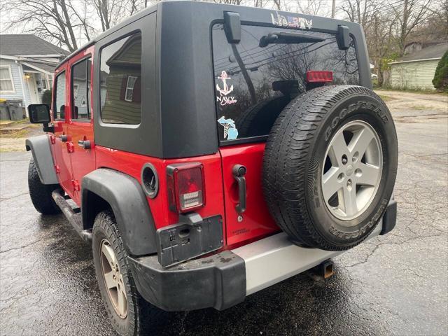 used 2009 Jeep Wrangler Unlimited car, priced at $10,900