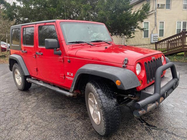 used 2009 Jeep Wrangler Unlimited car, priced at $10,900