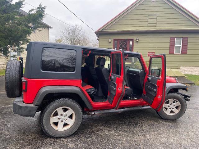 used 2009 Jeep Wrangler Unlimited car, priced at $10,900