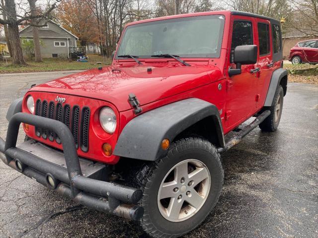 used 2009 Jeep Wrangler Unlimited car, priced at $10,900