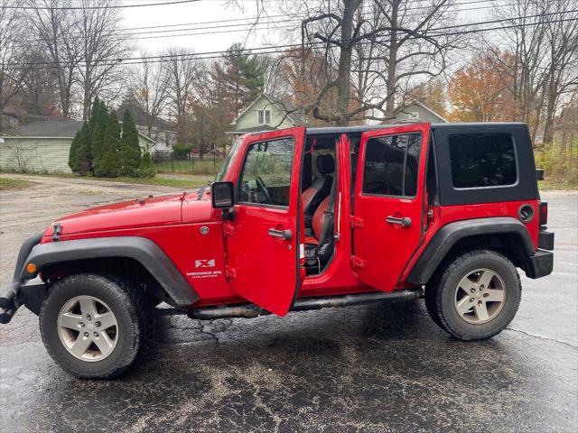 used 2009 Jeep Wrangler Unlimited car, priced at $10,900