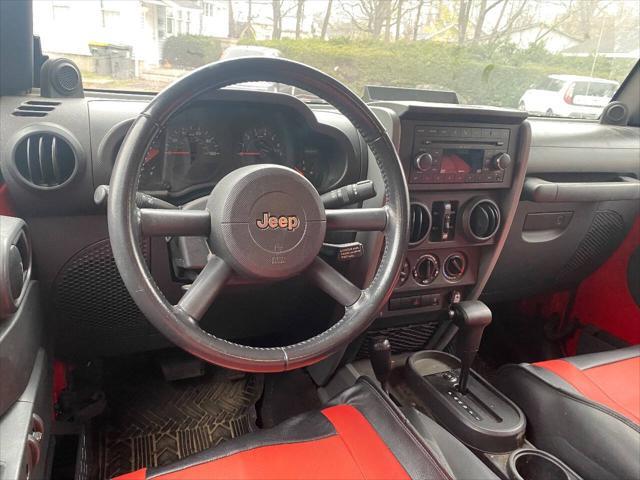 used 2009 Jeep Wrangler Unlimited car, priced at $10,900