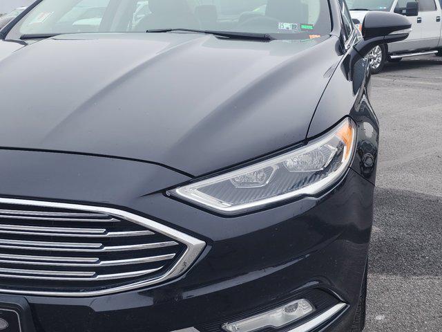 used 2018 Ford Fusion car, priced at $13,700