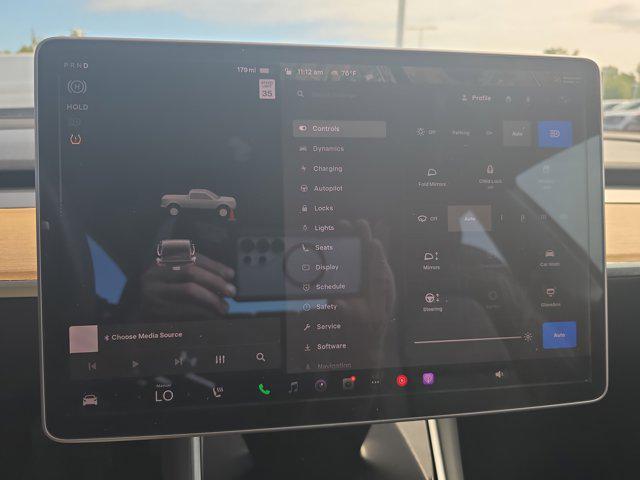used 2018 Tesla Model 3 car, priced at $22,900