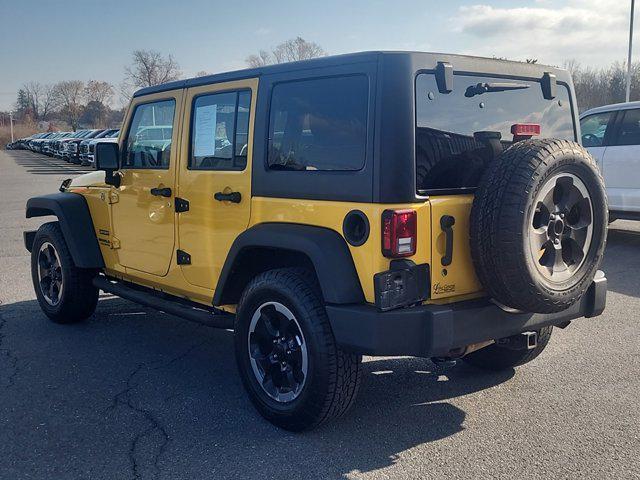 used 2015 Jeep Wrangler Unlimited car, priced at $21,900