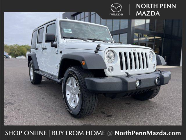 used 2018 Jeep Wrangler JK Unlimited car, priced at $27,500