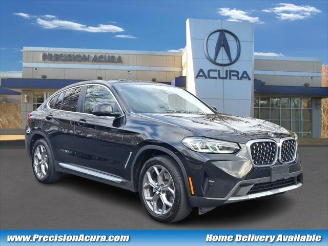 used 2022 BMW X4 car, priced at $37,495