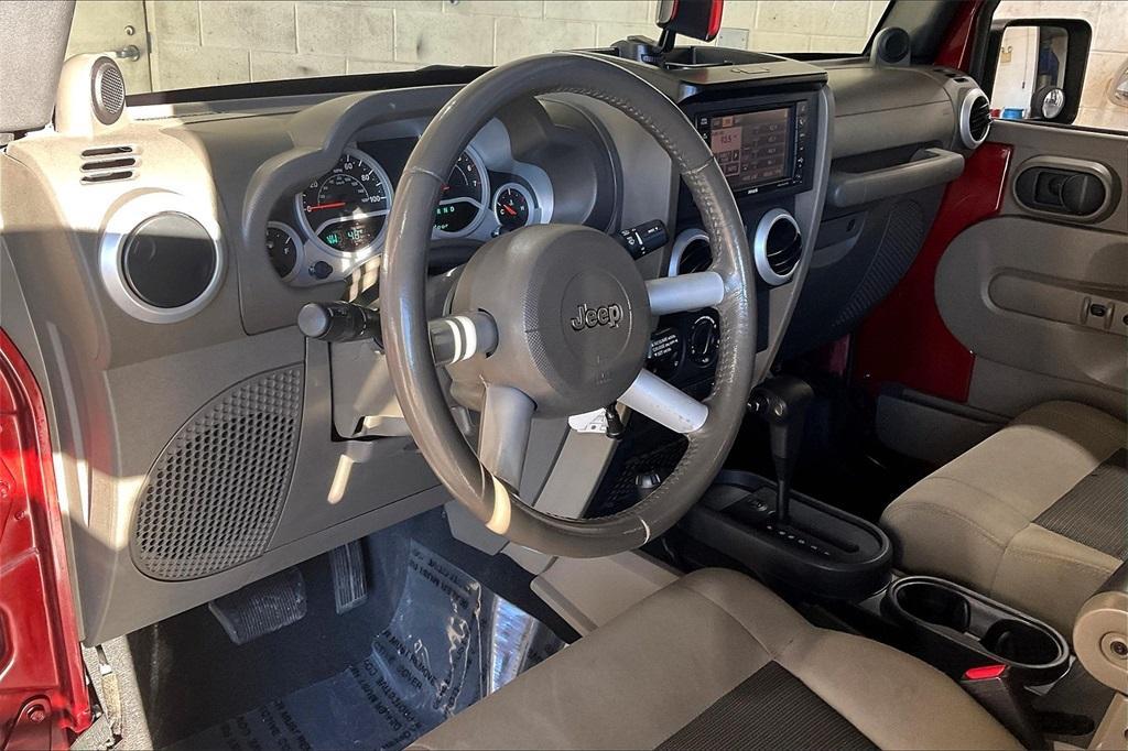 used 2010 Jeep Wrangler Unlimited car, priced at $13,644