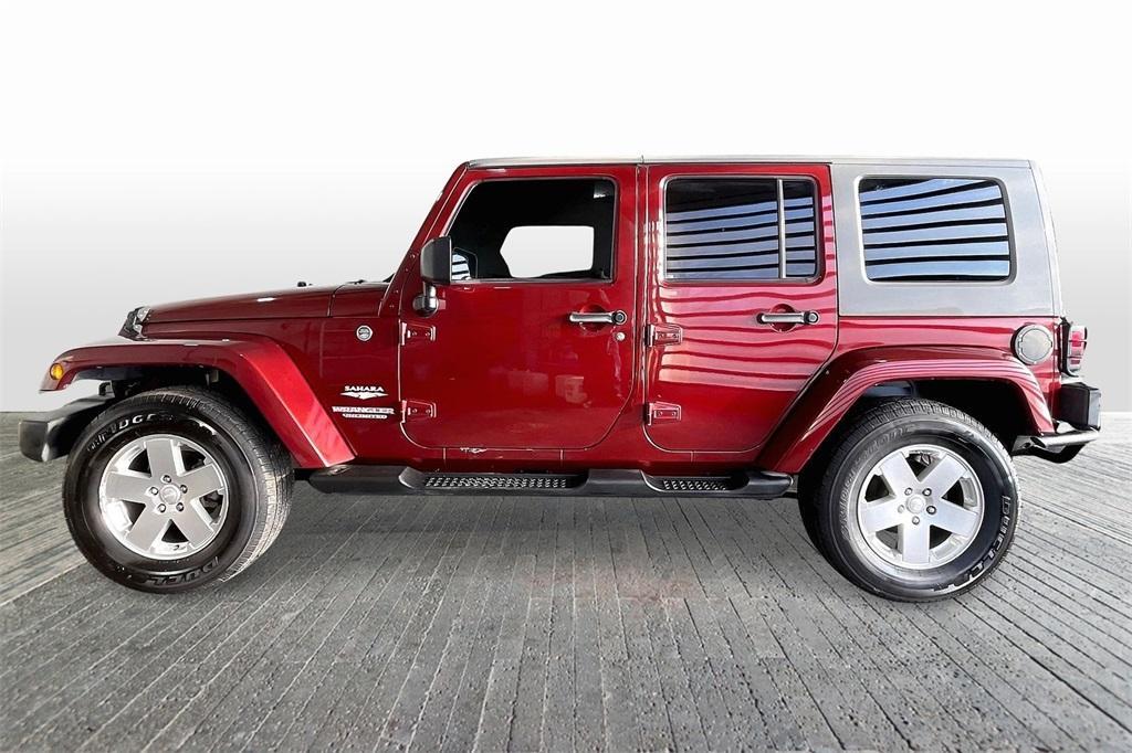 used 2010 Jeep Wrangler Unlimited car, priced at $13,644