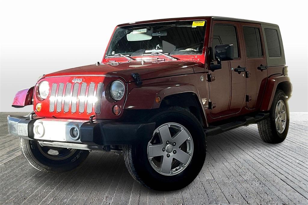 used 2010 Jeep Wrangler Unlimited car, priced at $13,644