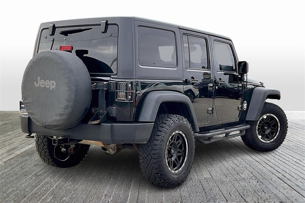 used 2015 Jeep Wrangler Unlimited car, priced at $17,495