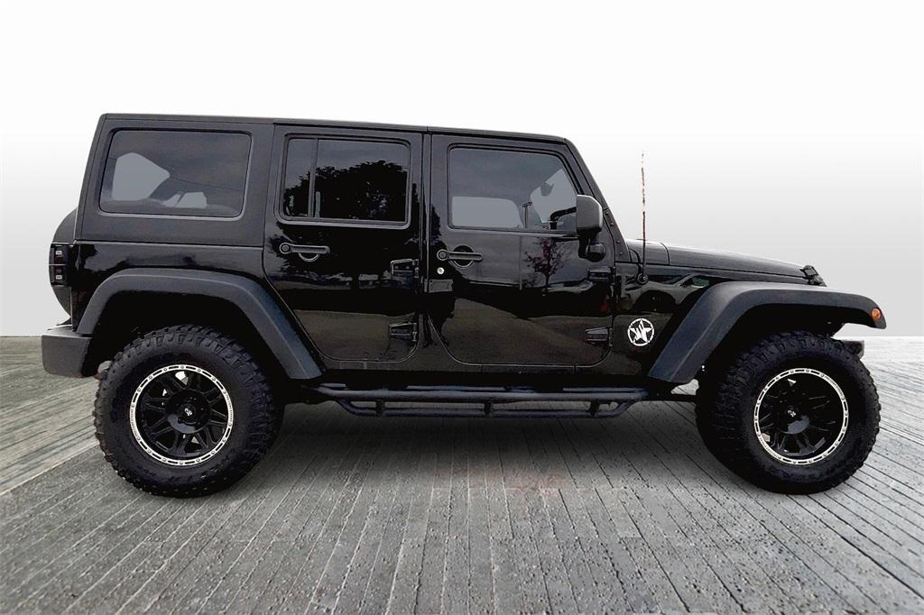 used 2015 Jeep Wrangler Unlimited car, priced at $17,495