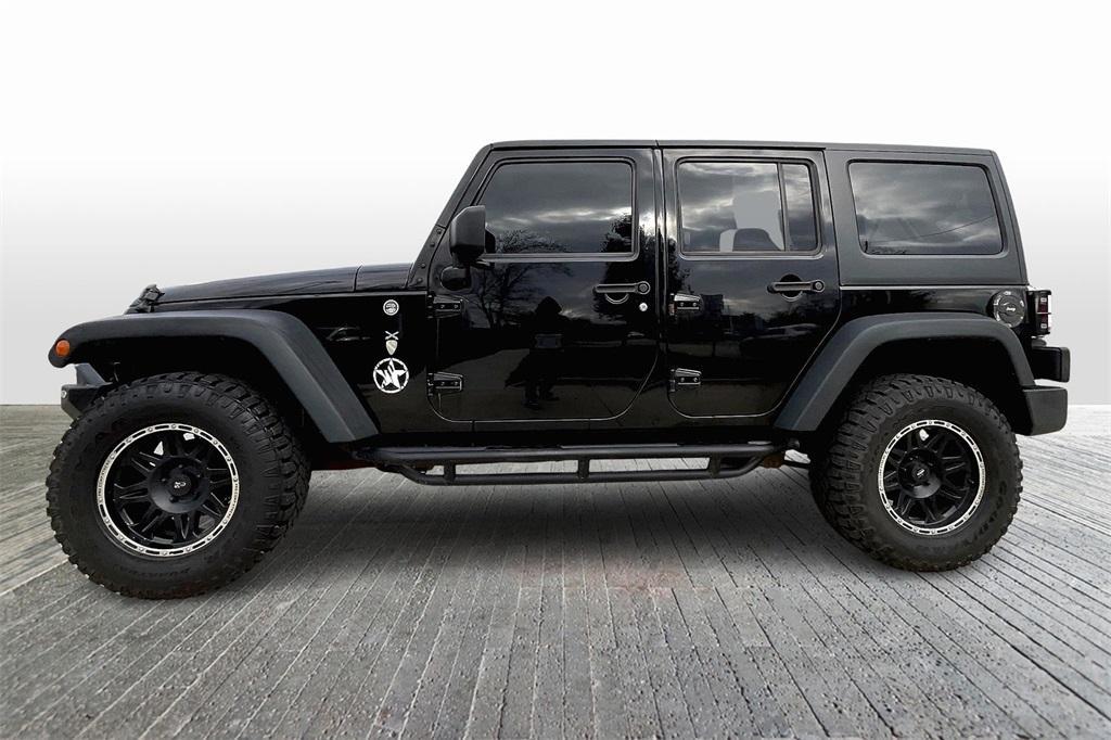 used 2015 Jeep Wrangler Unlimited car, priced at $17,495