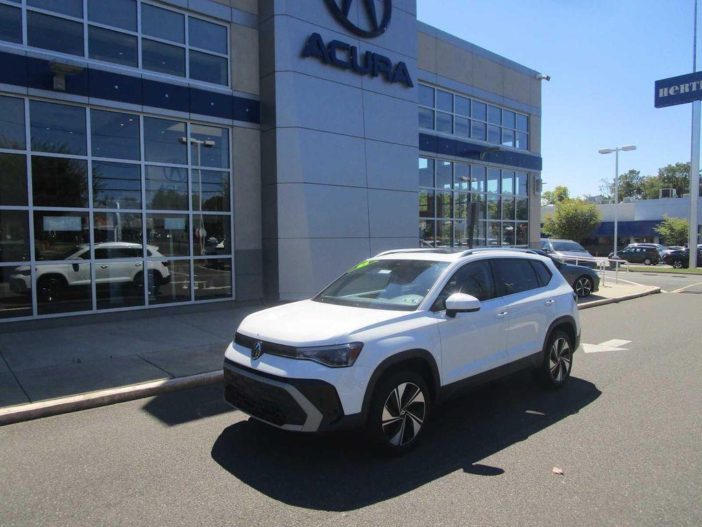 used 2025 Volkswagen Taos car, priced at $29,698