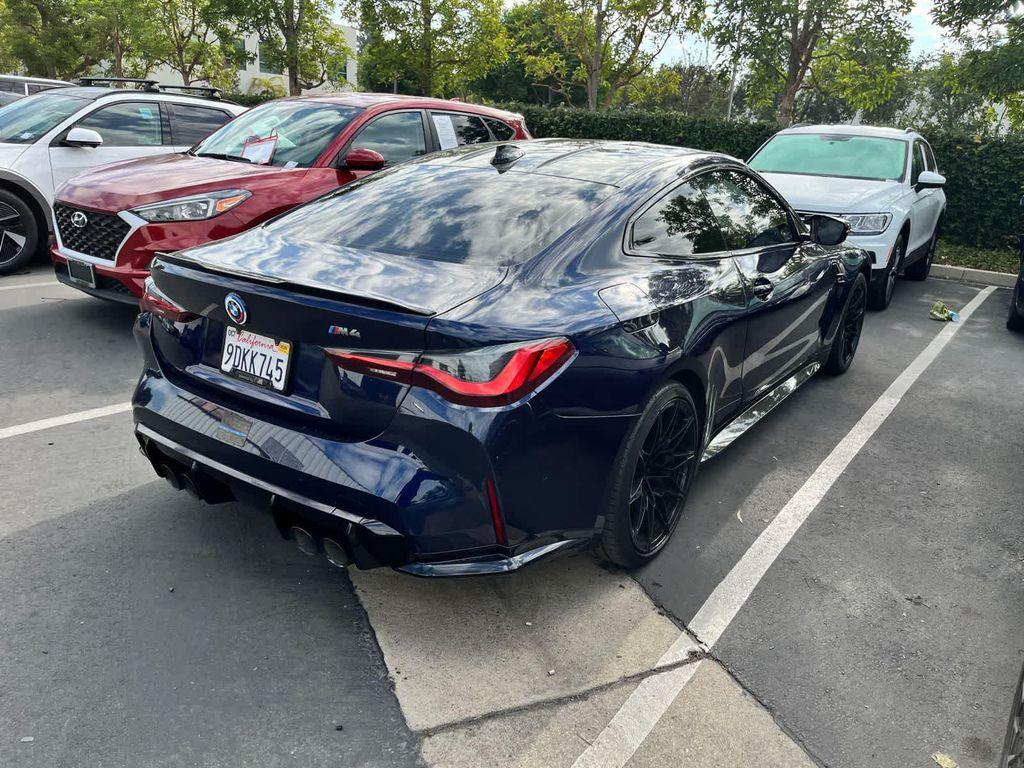 used 2023 BMW M4 car, priced at $66,552