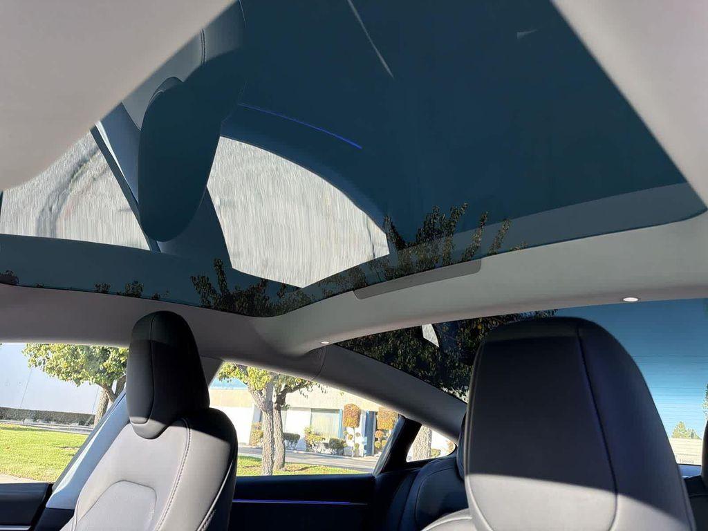 used 2025 Tesla Model 3 car, priced at $36,442